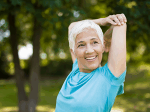 Mature woman walking confidently after non-surgical muscle toning treatment in Brisbane